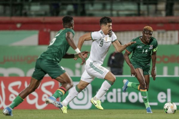 14 November 2019, Algeria, Blida: Algeria's Baghdad Bounedjah (C) and Zambia's Kabaso Chongo (R) vie for the ball during the 2021 Africa Cup of Nations qualifying Group H soccer match between Algeria and Zambia at the Mustapha Tchaker Stadium. PHOTO | AFP