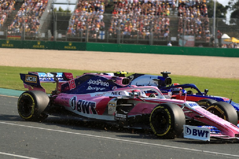 17th March 2019, Melbourne Grand Prix Circuit, Melbourne, Australia; Melbourne Formula One Grand Prix, race day; SportPesa Racing Point, Lance Stroll and Scuderia Toro Rosso, Daniil Kvyat battle together on lap 1. PHOTO/GettyImages