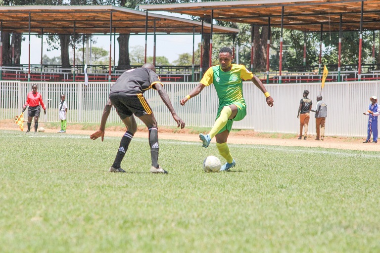   CAPTION: Action between Kariobangi Sharks FC (in green) against Elim FC of Trans Nzoia at Bukhungu Stadium in Kakamega on  March 16, 2019. PHOTO/FKF