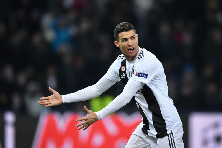   Juventus' Portuguese forward Cristiano Ronaldo reacts during the UEFA Champions League group H football match between Young Boys and Juventus at the Stade de Suisse stadium on December 12, 2018, in Bern, Switzerland.PHOTO/AFP
