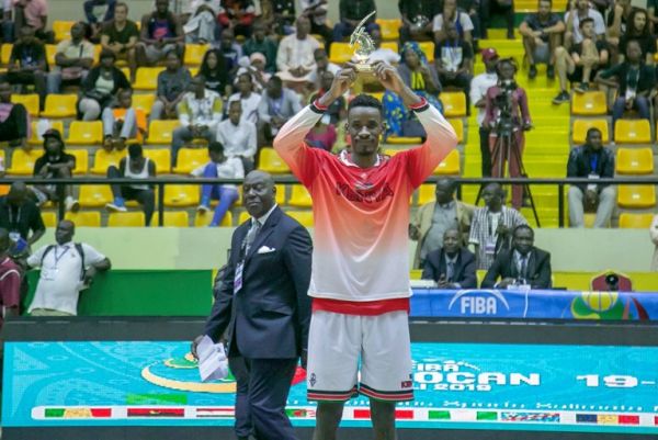 Kenya Morans and Bakken Bears forward Tylor Okari Ongwae with his Top Scorer Award trophy in Bamako, Mali on July 27, 2019. PHOTO/ FIBA.COM