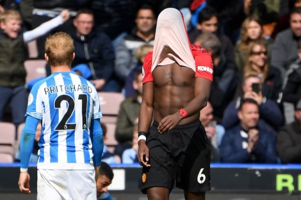   Manchester United's French midfielder Paul Pogba reacts on the pitch after the English Premier League football match between Huddersfield Town and Manchester United at the John Smith's stadium in Huddersfield, northern England on May 5, 2019. Manchester United fail to qualify for the Champions League after 1-1 draw at Huddersfield. PHOTO/AFP