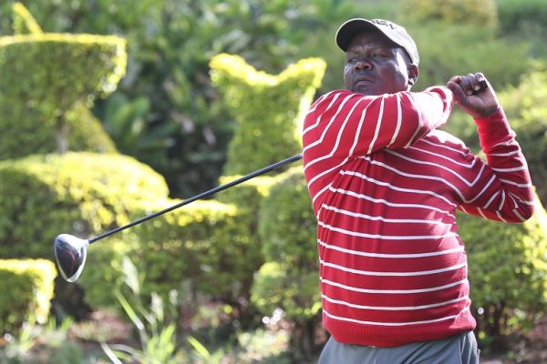 Dismas Indiza follows the flight of his drive at a past event. He is the leading at the ongoing Lake Serena Open in Kampala. PHOTO/ SPN