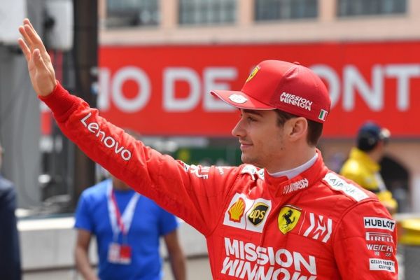  Ferrari's Monegasque driver Charles Leclerc waves to fans ahead of the qualifying session at the Monaco street circuit on May 25, 2019 in Monaco, ahead of the Monaco Formula 1 Grand Prix. PHOTO/AFP