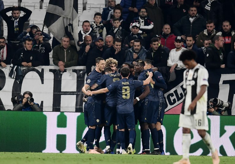 (From L) Manchester United's Serbian midfielder Nemanja Matic, Manchester United's Belgian midfielder Marouane Fellaini, Manchester United's Spanish midfielder Juan Mata, Manchester United's French midfielder Paul Pogba and temmates celebrate after their second goal during the UEFA Champions League group H football match Juventus vs Manchester United at the Allianz stadium in Turin on November 7, 2018.PHOTO / AFP 