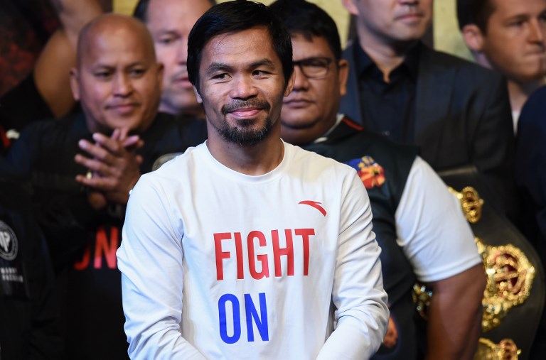 In this file photo taken on July 14, 2018 Philippines' Manny Pacquiao attends the weigh-in in Kuala Lumpur ahead of his world welterweight boxing championship bout against Argentina's Lucas Matthysse on July 15, 2018.PHOTO/AFP