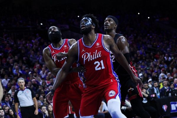  Joel Embiid, James Harden of Philadelphia 76ers and Jimmy Butler of Miami Heat in action during NBA semifinals between Philadelphia 76ers and Miami Heat at the Wells Fargo Center in Philadelphia, Pennsylvania, United States on May 8, 2022. PHOTO | AFP