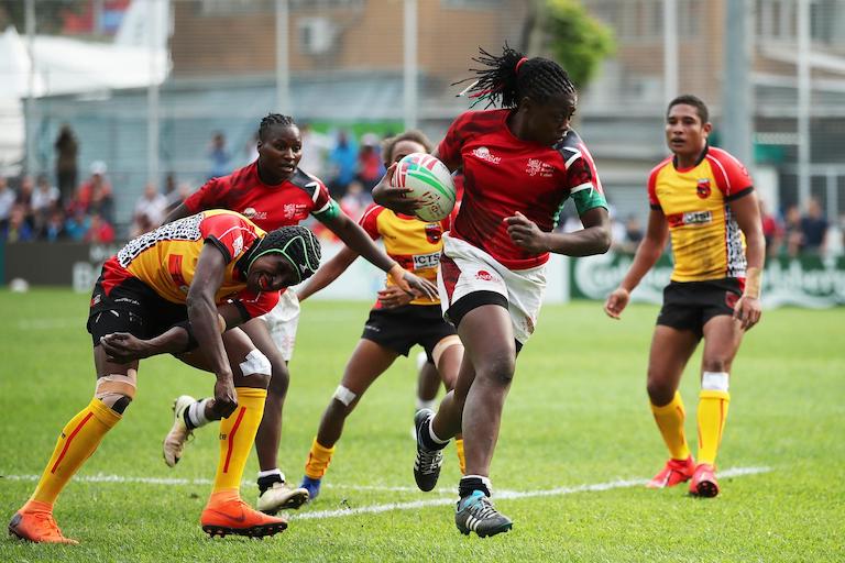  Kenya's Sheilla Chajira cuts through the Papua New Guinea defense on day one of the World Rugby Women's Sevens Series Qualifier in Hong Kong on 4 April, 2019. PHOTO/Mike Lee/KLC fotos for World Rugby