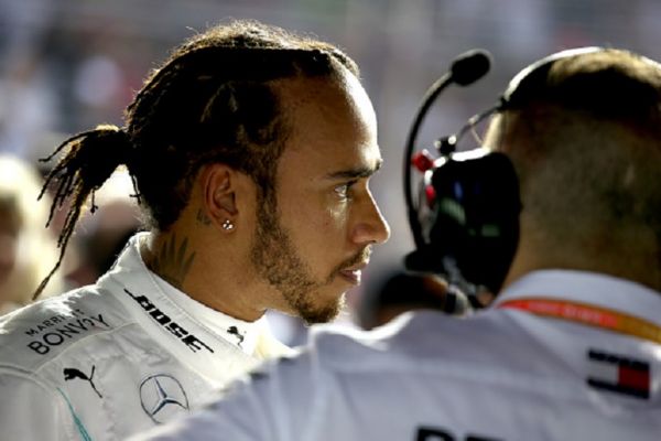  Lewis Hamilton of Great Britain and Mercedes GP prepares to drive on the grid before the F1 Grand Prix of Singapore at Marina Bay Street Circuit on September 22, 2019 in Singapore.PHOTO/ GETTY IMAGES