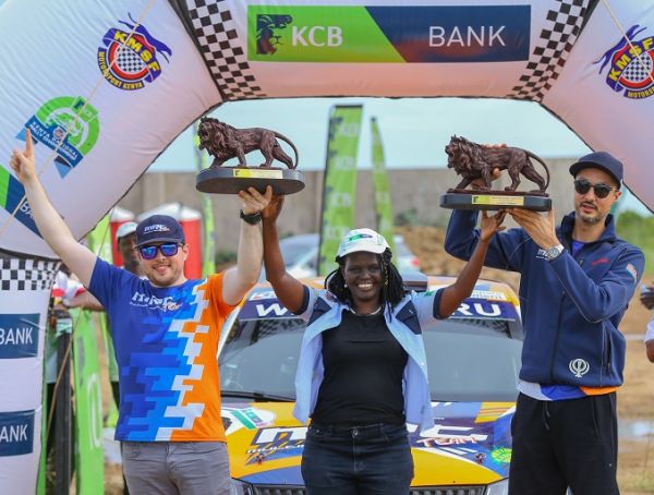 (R-L) KCB Kenya National Rally Championship (KNRC) Kilifi winner Manvir Baryan, KCB Regional Business Manager Coast Region Jane Isiaho and Manvir’s navigator Drew Sturrock during the fourth round of KCB KNRC prize Giving ceremony at Mombasa Cement, Kilifi.PHOTO/ SPN