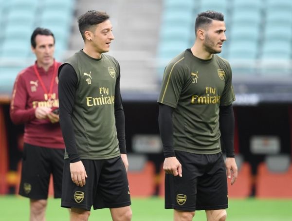  Soccer: Europa League, before the final FC Chelsea - FC Arsenal. Coach Unai Emery (l-r), Mesut Özil and Sead Kolasinac take part in the final training of FC Arsenal at the Olympic Stadium. The final of the Europa League between FC Chelsea and FC Arsenal will take place here on 29 May 2019. PHOTO | AFP