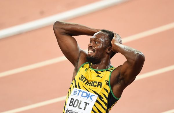 A file photo dated August 29, 2015 shows Usain Bolt of Jamaica celebrates after wining gold in the Men's 4x100 Metres Relay final during the '15th IAAF World Athletics Championships Beijing 2015' at Beijing National Stadium (Bird's Nest) in Beijing, China. PHOTO | AFP