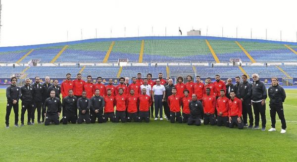 A handout picture released by the Egyptian Presidency on June 15, 2019 shows Egyptian President Abdel Fattah al-Sisi (C) posing for a picture with the Egyptian national squad during their training camp at the 30 June Stadium in Cairo. The Africa Cup of Nations will be contested by a record 24 teams in Egypt this month, up from just three when the tournament debuted 62 years ago. Hosts Egypt are favoured not only to win Group A at the 2019 Africa Cup of Nations this June, but to go on and lift the trophy a record-extending eighth time. PHOTO | AFP