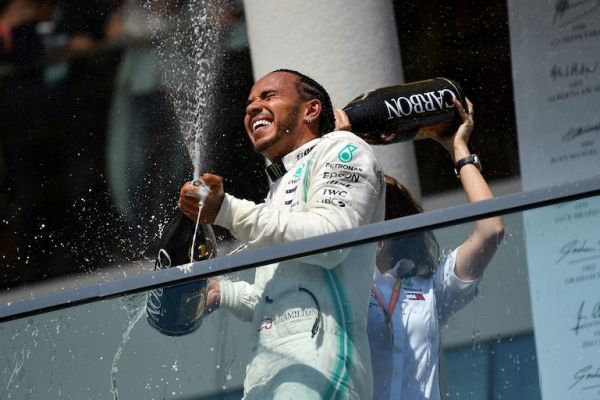 ace winner Lewis Hamilton of Great Britain and Mercedes GP celebrates on the podium during the F1 Grand Prix of Canada at Circuit Gilles Villeneuve on June 09, 2019 in Montreal, Canada. PHOTO/AFP