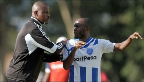 AFC Leopards SC coach Andre Casa Mbungo and midfielder Whyvonne Isuza. PHOTO | NairobiNews