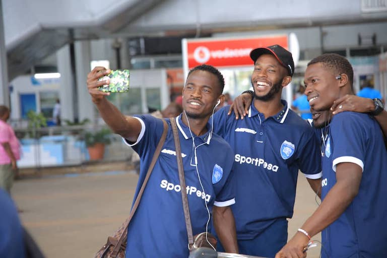 AFC Leopards SC players, (L to R) Yusuf Mainge, Moses Mburu and Jaffery Owiti could not resist taking a selfie upon landing at the Julius Nyerere International Airport on Saturday, January 19, 2019 for the SportPesa Cup showdown. PHOTO/SPN