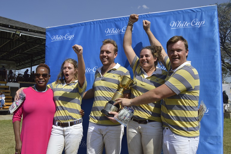 Afrika Aviation team  comprising of  Georgina Millar (second left),Nick Millar, Aisha Gross and Gareth Evans after lifting the Six-Goal Tournament Cup at the Nairobi Polo Club on September 16, 2018.PHOTO/SPN