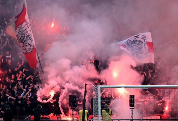 Ajax fans light up flares. PHOTO| AFP