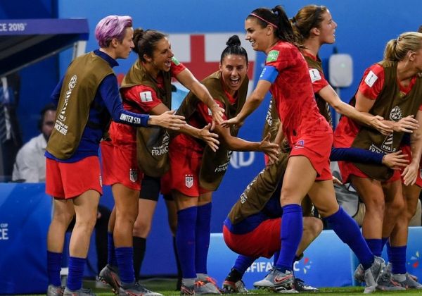 Alex Morgan (4th L) of the United States celebrates scoring a goal with her teammates during the semifinal between the United States and England at the 2019 FIFA Women's World Cup at Stade de Lyon in Lyon, France on July 2, 2019. PHOTO | AFP