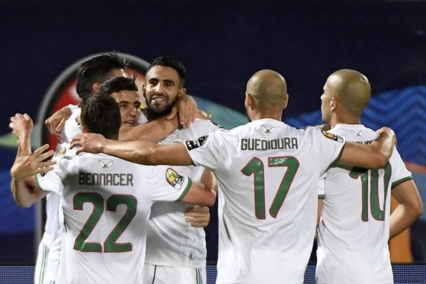 Algeria's forward Riyad Mahrez (4th-L) celebrates after scoring a goal during the 2019 Africa Cup of Nations (CAN) Round of 16 football match between Algeria and Guinea at the 30 June Stadium in the Egyptian capital Cairo on July 7, 2019. PHOTO/AFP