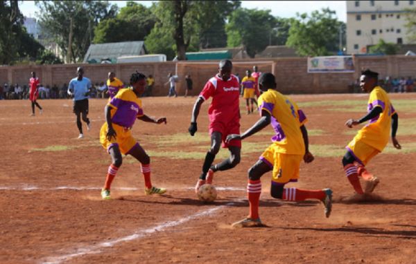 Allin Jua Kali FC in action at the 2019 Koth Biro tournament in Ziwani, Nairobi. PHOTO | The Star