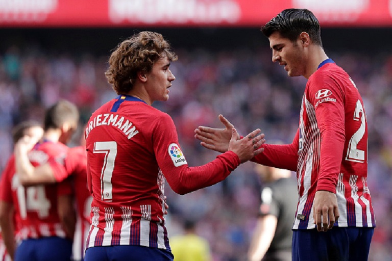 Alvaro Morata of Atletico Madrid celebrates with teammate Antoine Griezmann after scoring his team's first goal during the La Liga match between Club Atletico de Madrid and Villarreal CF at Wanda Metropolitano on February 24, 2019 in Madrid, Spain. PHOTO/GettyImages