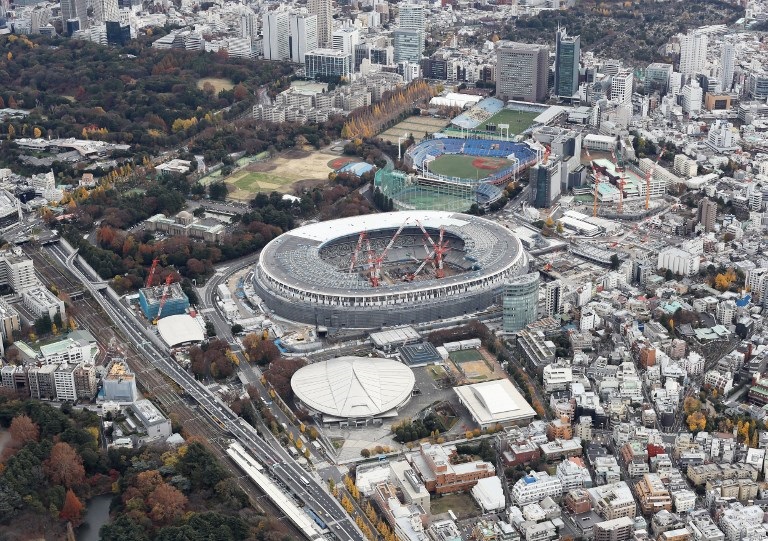 An aerial photo taken on Decmber 9, 2018 shows the new National Stadium under construction at Shinjuku Ward, Tokyo. The opening and closing ceremony will be held at this stadium. The new National Stadium will be planned to use 47 prefectural woods because it is a world-proud stadium that uses Japanese domestic timber.