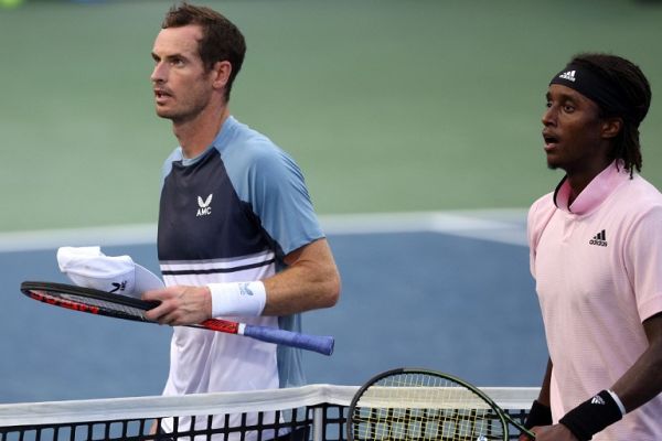 Andy Murray of Great Britain (L) walks off the court after losing to Mikael Ymer of Sweden during Day 3 of the Citi Open at Rock Creek Tennis Center on August 01, 2022 in Washington, DC. PHOTO | AFP