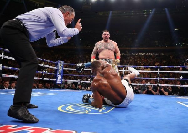 Andy Ruiz Jr knocks down Anthony Joshua in the third round during their IBF/WBA/WBO heavyweight title fight at Madison Square Garden on June 01, 2019 in New York City. PHOTO/AFP