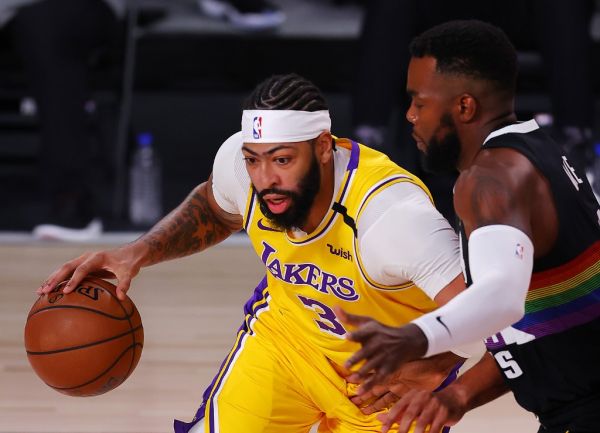 Anthony Davis #3 of the Los Angeles Lakers drives the ball during the first quarter against the Denver Nuggets in Game Four of the Western Conference Finals during the 2020 NBA Playoffs at AdventHealth Arena at the ESPN Wide World Of Sports Complex on September 24, 2020 in Lake Buena Vista, Florida. PHOTO | AFP