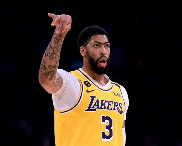 Anthony Davis #3 of the Los Angeles Lakers looks at the Brooklyn Nets bench after his three pointer during a 104-102 Nets win at Staples Center on March 10, 2020 in Los Angeles, California. PHOTO | AFP