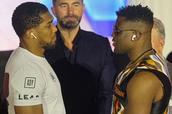 Anthony Joshua and Francis Ngannou. PHOTO| AFP