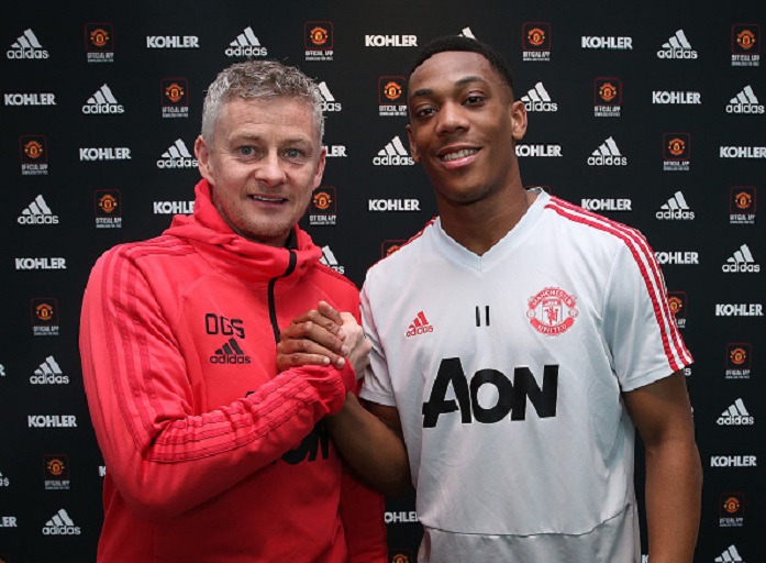 Anthony Martial poses with Caretaker Manager Ole Gunnar Solskjaer after signing an extension to his contract at Aon Training Complex on January 31, 2019 in Manchester, England. PHOTO/GettyImages