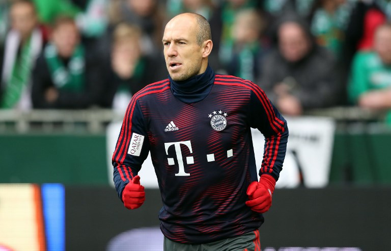 Arjen Robben, pictured warming up before the Bayern Bundesliga game against SV Werder Bremen. PHOTO/AFP 