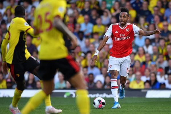 Arsenal's Gabonese striker Pierre-Emerick Aubameyang (R) controls the ball during the English Premier League football match between Watford and Arsenal at Vicarage Road Stadium in Watford, north of London on September 15, 2019. PHOTO | AFP