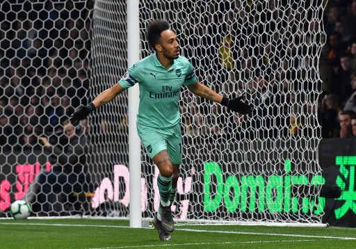 Arsenal's Gabonese striker Pierre-Emerick Aubameyang celebrates after scoring the opening goal of the English Premier League football match between Watford and Arsenal at Vicarage Road Stadium in Watford, north of London on April 15, 2019. PHOTO/AFP