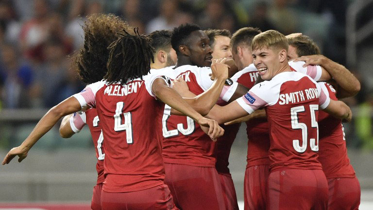 Arsenal's players celebrate a goal during the UEFA Europa League group E football match between Qarabag FK and Arsenal FC in Baku on October 4, 2018. PHOTO/AFP