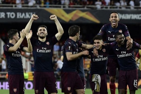 Arsenal's players celebrate at the end of the UEFA Europa League semi-final second leg football match between Valencia CF and Arsenal FC at the Mestalla stadium in Valencia on May 9, 2019. PHOTO/AFP