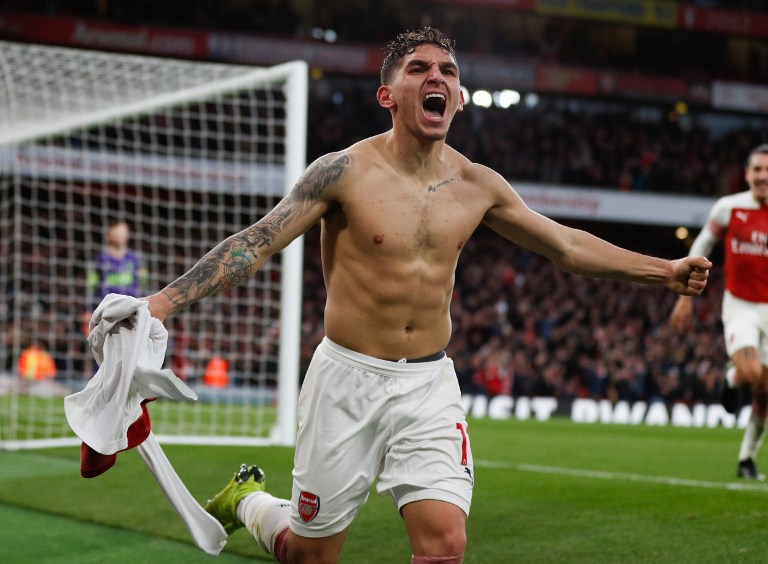 Arsenal's Uruguayan midfielder Lucas Torreira celebrates after scoring their fourth goal during the English Premier League football match between Arsenal and Tottenham Hotspur at the Emirates Stadium in London on December 2, 2018. PHOTO/AFP