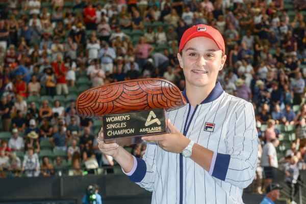 Ashleigh Barty of Australia poses with the winner's trophy after defeating Dayana Yastremska of Ukraine in their women's final singles match at the Adelaide International tennis tournament in Adelaide on January 18, 2020. PHOTO | AFP