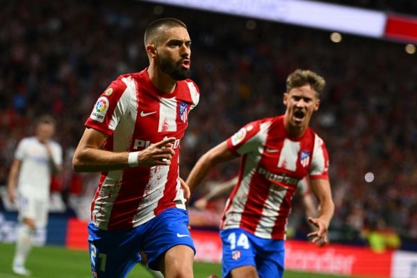 Atletico Madrid's Belgian midfielder Yannick Ferreira-Carrasco celebrates after scoring his team's first goal during the Spanish League football between Club Atletico de Madrid and Real Madrid CF at the Wanda Metropolitano stadium in Madrid on May 8, 2022. PHOTO | AFP