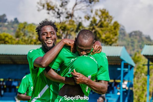 Austin Odhiambo (left) celebrates with Alpha Onyango (right) in a previous match. PHOTO| SportPesa