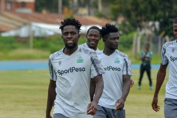 Austine Odhiambo in front of new Gor signing Shariff Musa. PHOTO| Gor Mahia