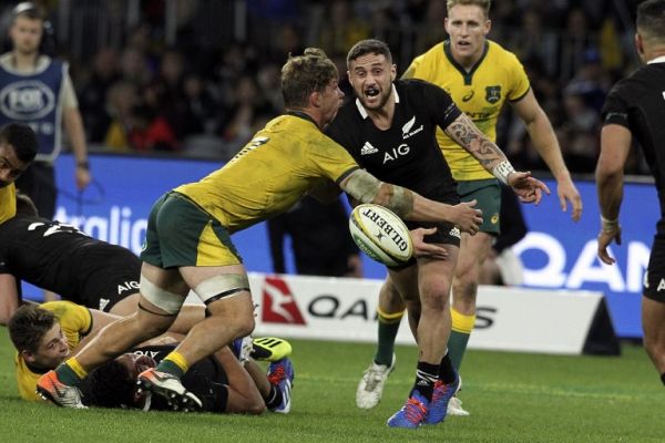 Australia’s captain Michael Hooper (L) tackles New Zealand’s T J Perenara during the Rugby Championship Bledisloe Cup Test match between the Australian Wallabies and New Zealand All Blacks in Perth on August 10, 2019. PHOTO | AFP