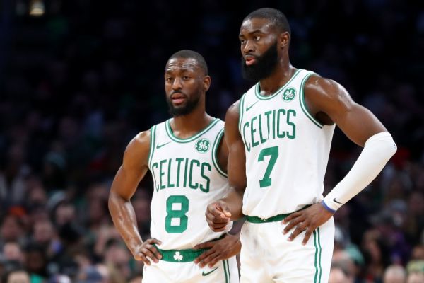 aylen Brown #7 of the Boston Celtics and Kemba Walker #8 talk during the second half of the game between the Boston Celtics and the Miami Heat at TD Garden on December 04, 2019 in Boston, Massachusetts. PHOTO | AFP