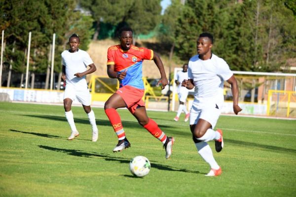 Ayub Timbe (right) in action against the DRC during during their Saturday, June 15, 2019 friendly against the DRC in Madrid, Spain. PHOTO/Courtesy/FKF