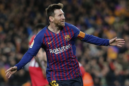 Barcelona's Argentinian forward Lionel Messi celebrates his goal during the Spanish league football match between FC Barcelona and Club Atletico de Madrid at the Camp Nou stadium in Barcelona on April 6, 2019. PHOTO/AFP