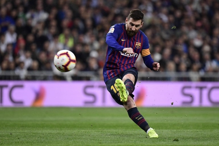 Barcelona's Argentinian forward Lionel Messi kicks the ball during the Spanish league football match between Real Madrid CF and FC Barcelona at the Santiago Bernabeu stadium in Madrid on March 2, 2019. PHOTO/ AFP