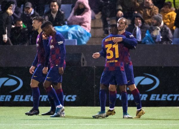 Barcelona's French forward Antoine Griezmann (R) celebrates after scoring his team's second goal during the Copa del Rey (King's Cup) football match between UD Ibiza and FC Barcelona at the Can Misses municipal stadium in Ibiza, on January 22, 2020. PHOTO | AFP