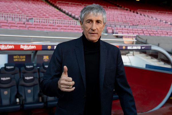 Barcelona's new coach Quique Setien poses for a photo during his official presentation at the Camp Nou stadium in Barcelona on January 14, 2020, after signing his new contract with the Catalan club. PHOTO | AFP